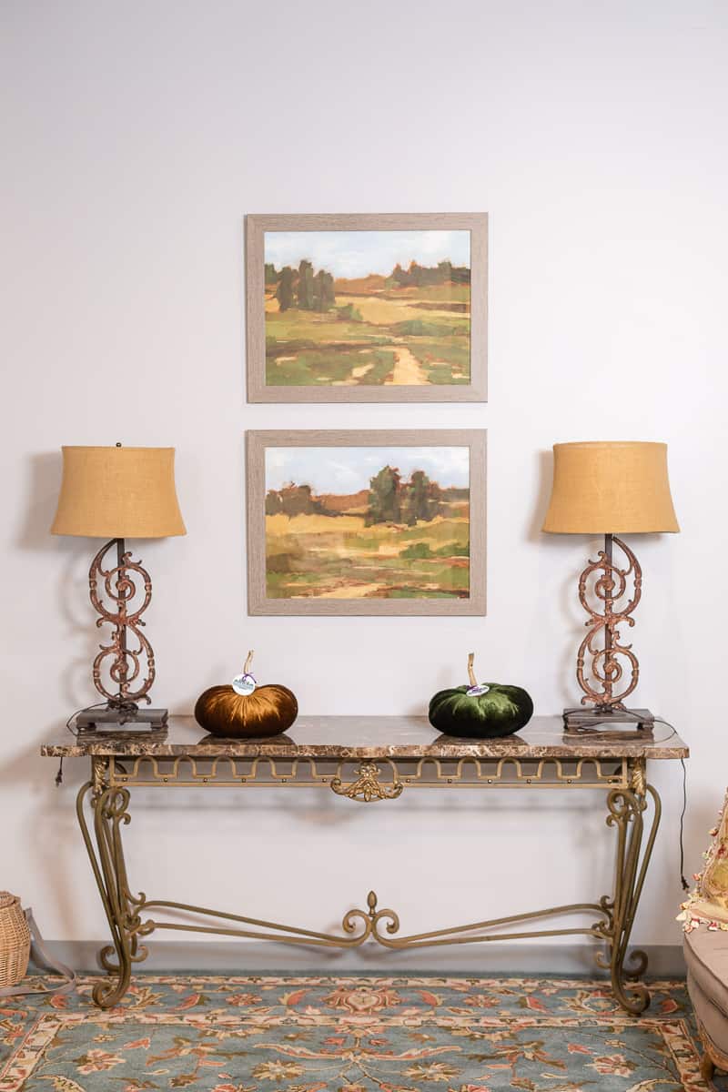 foyer table with two french style lamps